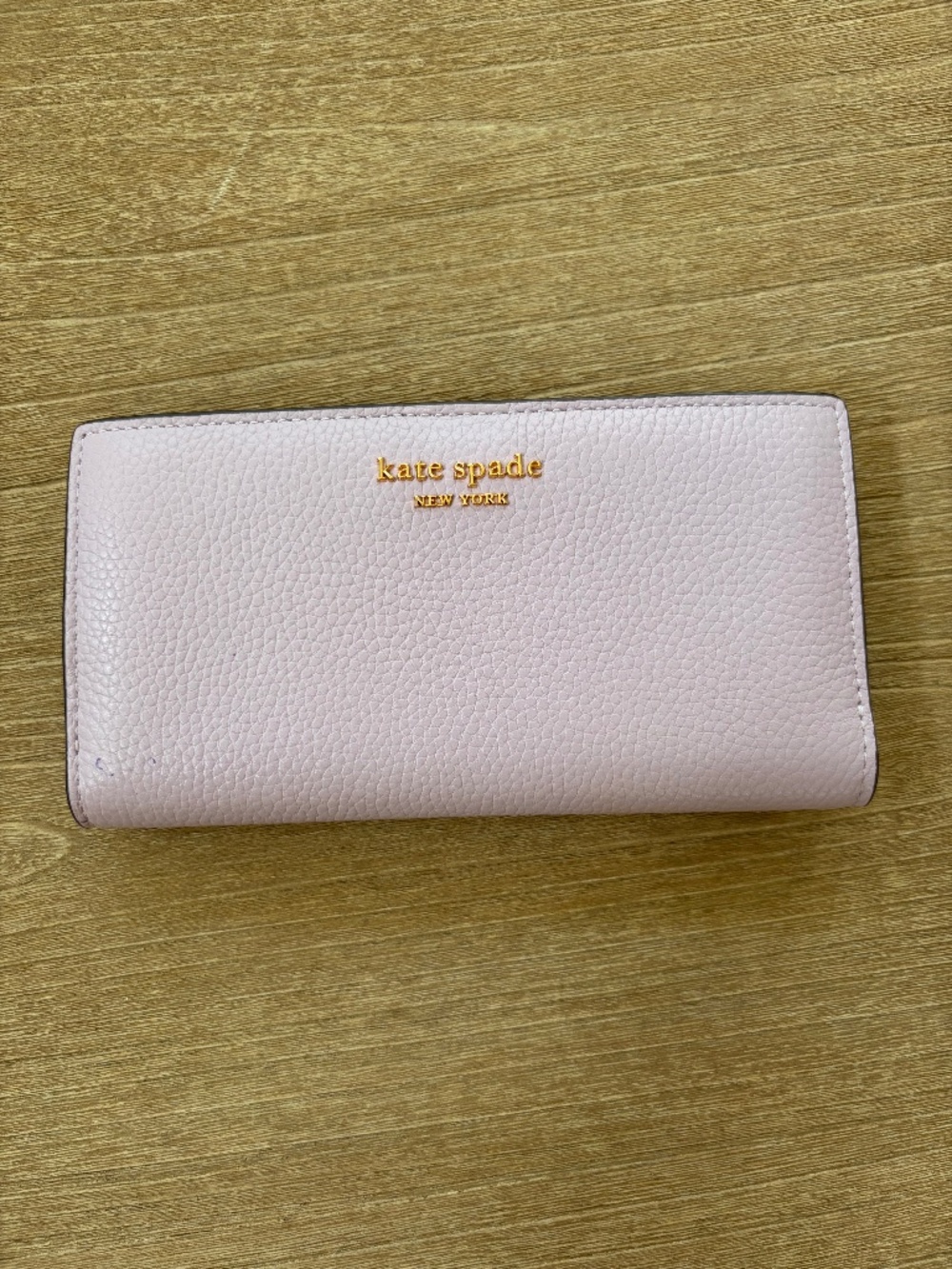 Kate Spade Violet Leather Bi-Fold Wallet with Snap Closure